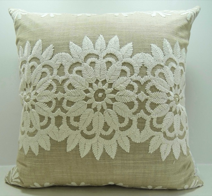 Embroidered medallion cushion