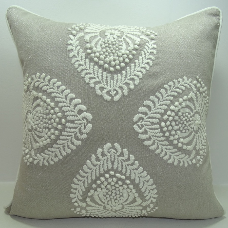 Block-print style embroidered cushion in taupe